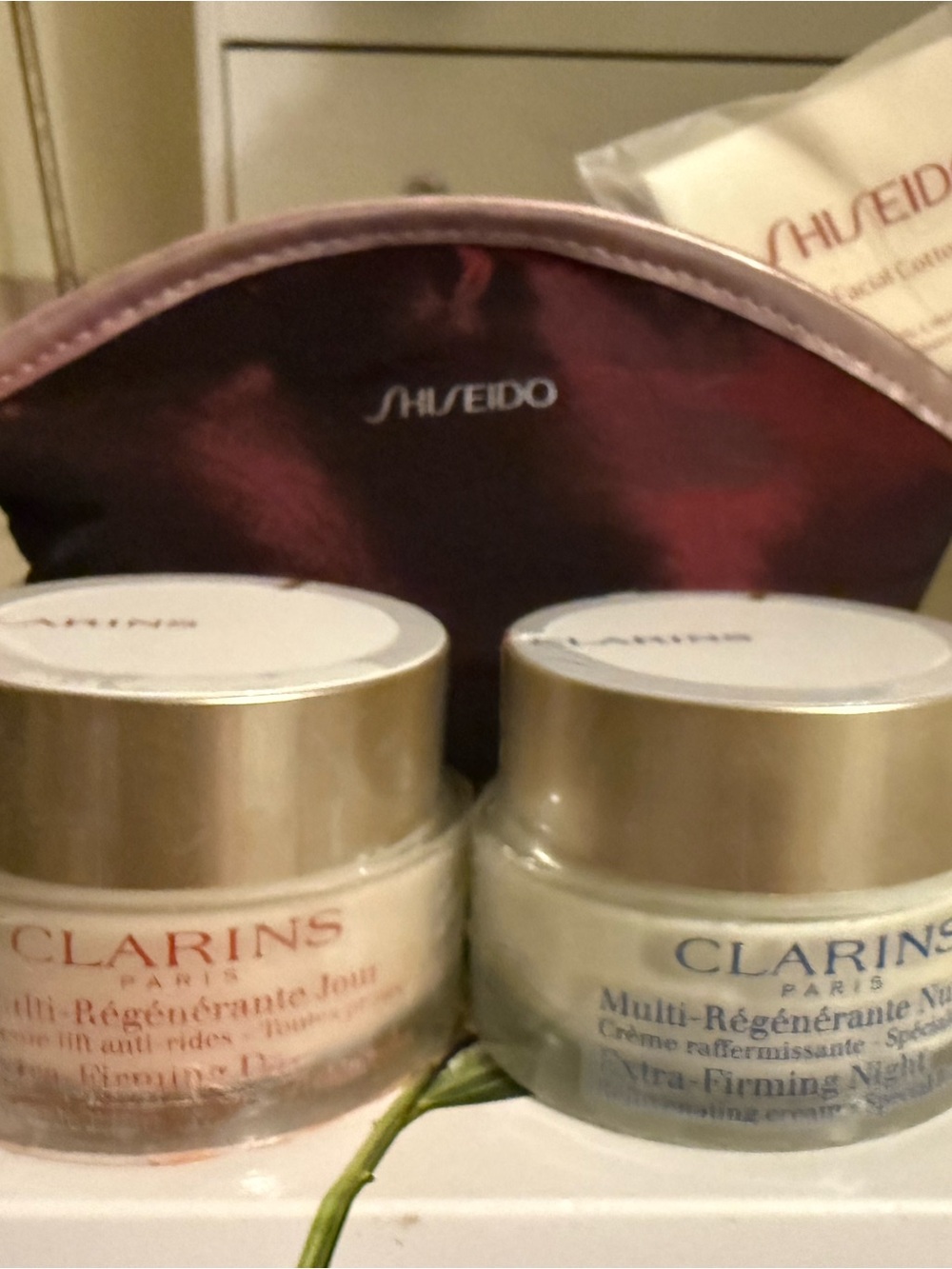 Clarins Day & Night Moisturizer Duo in Red and Light Blue